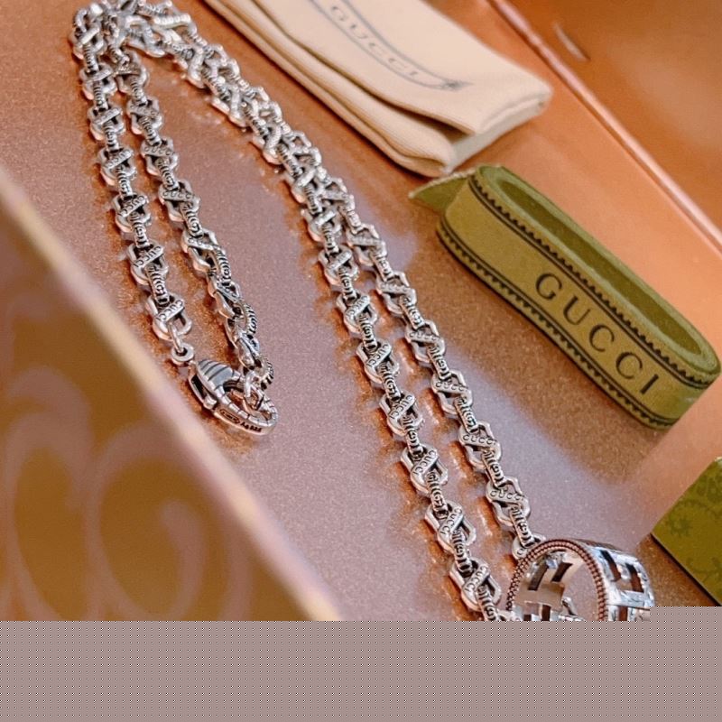 G*u*i necklaces